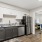 a kitchen with white cabinets